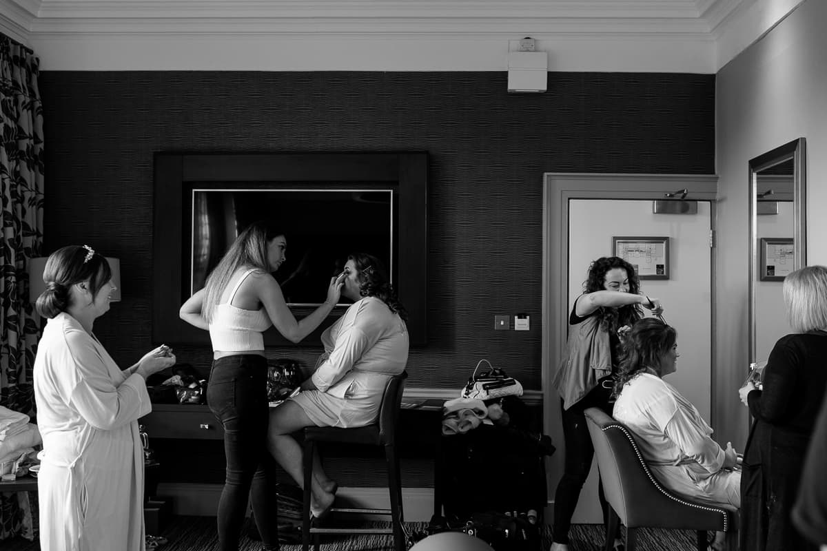 Black and white picture of bridal preparations at Abbey House Hotel, Barrow in Furness