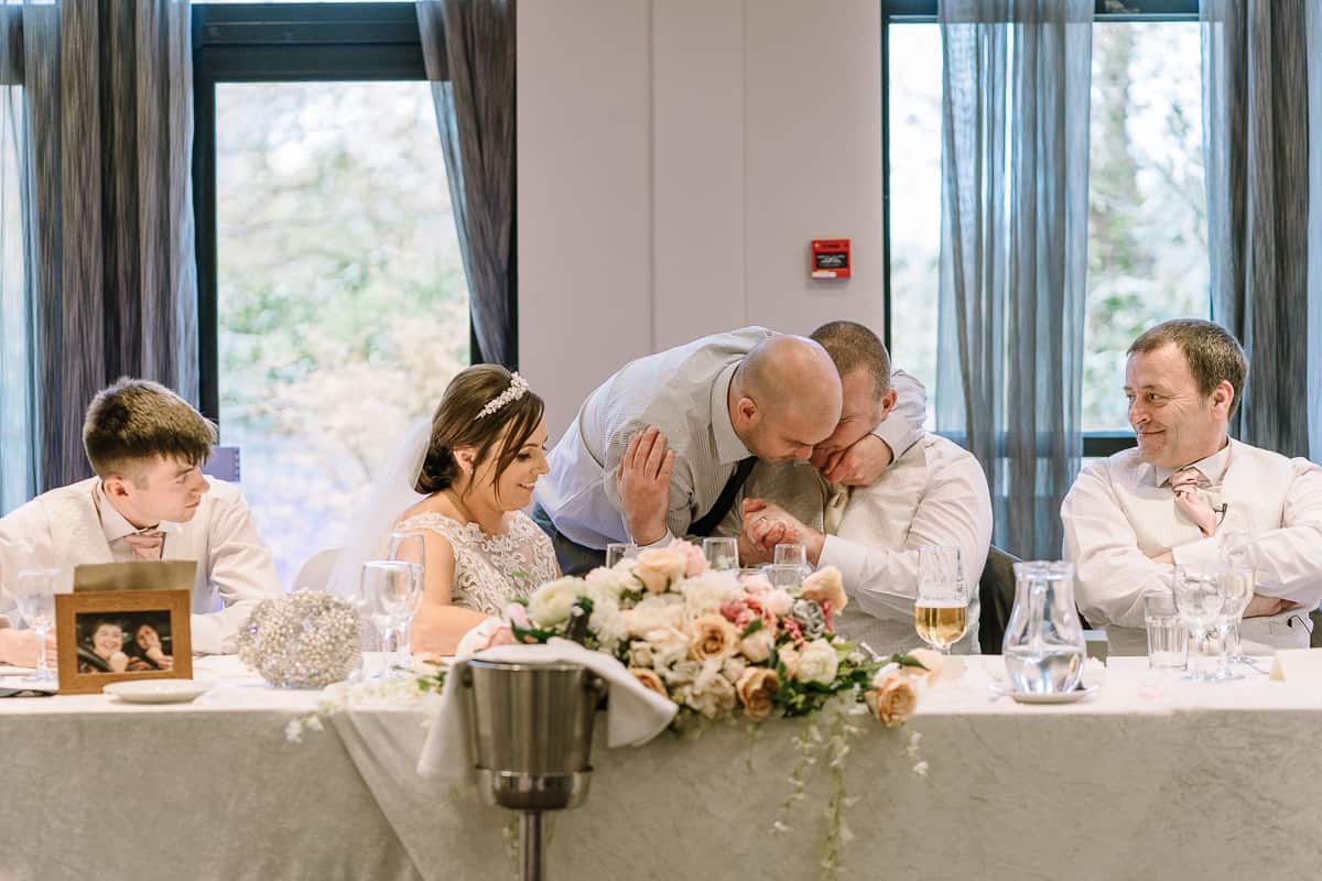 Congratulations to the groom from his brother on his wedding after the speeches at Abbey House Hotel, Barrow